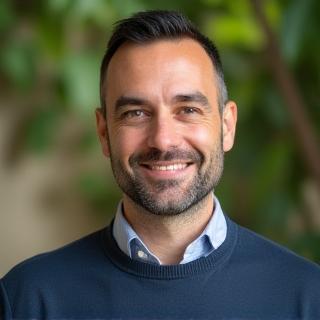 Professional headshot of Mihai Stoica, Culinary Tourism Specialist.